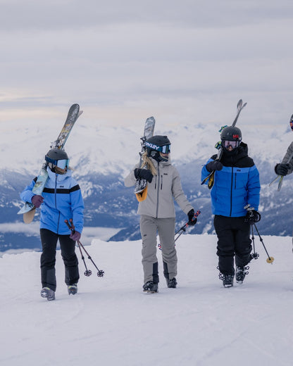 Concrete Coloured Helly Hansen Mens Alpha Lifaloft Insulated Ski Pants on snow background 