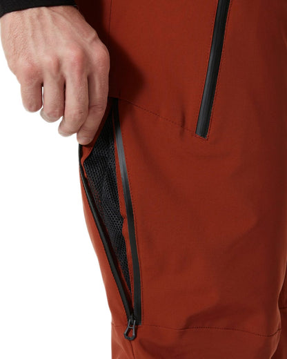 Iron Oxide Coloured Helly Hansen Mens Alpha Lifaloft Insulated Ski Pants on white background 