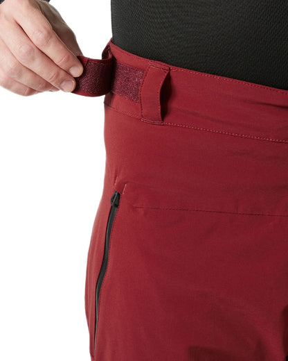 Mars Red Coloured Helly Hansen Mens Alpha Lifaloft Insulated Ski Pants on white background 
