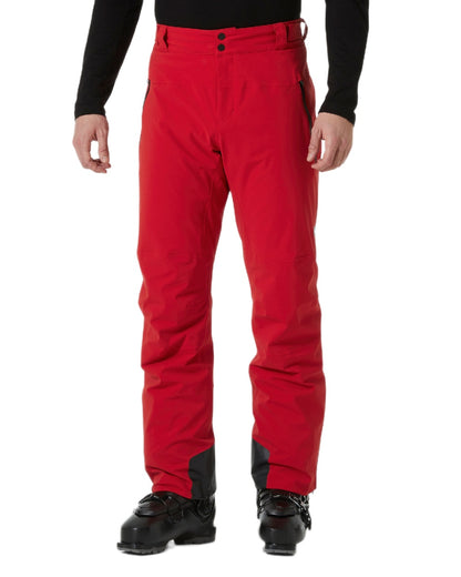 Red Coloured Helly Hansen Mens Alpha Lifaloft Insulated Ski Pants on white background 