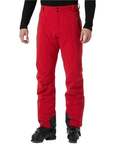 Red Coloured Helly Hansen Mens Alpha Lifaloft Insulated Ski Pants on white background 