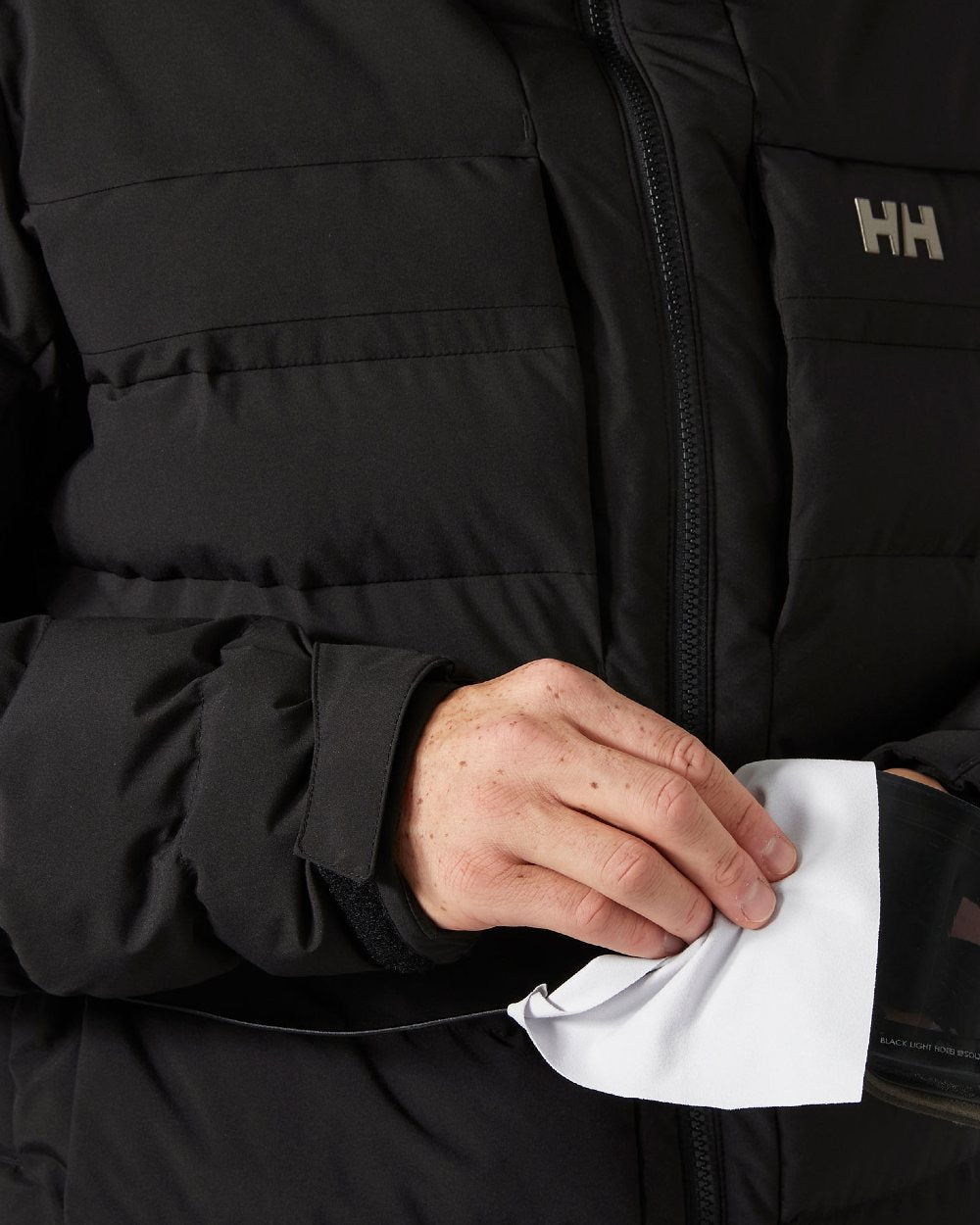 Black Coloured Helly Hansen Mens Bossanova Puffy 2.0 Jacket on white background 