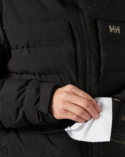 Black Coloured Helly Hansen Mens Bossanova Puffy 2.0 Jacket on white background 