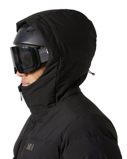 Black Coloured Helly Hansen Mens Bossanova Puffy 2.0 Jacket on white background 