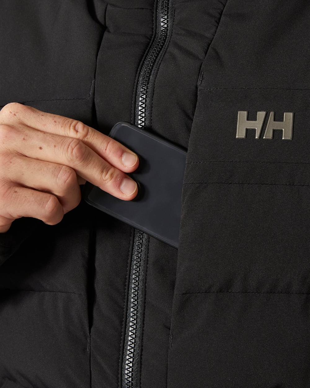 Black Coloured Helly Hansen Mens Bossanova Puffy 2.0 Jacket on white background 