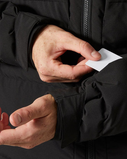 Black Coloured Helly Hansen Mens Bossanova Puffy 2.0 Jacket on white background 