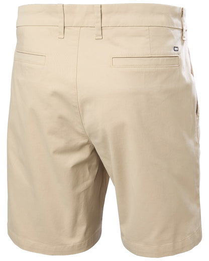 Khaki coloured Helly Hansen Mens Bryggen Chino Shorts on white background 