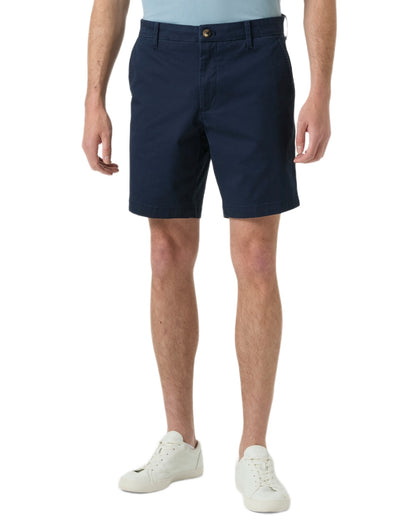 Navy coloured Helly Hansen Mens Bryggen Chino Shorts on white background 