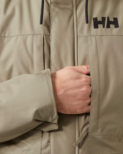 Pebble Coloured Helly Hansen Mens Coastal 3.0 Parka on white background 