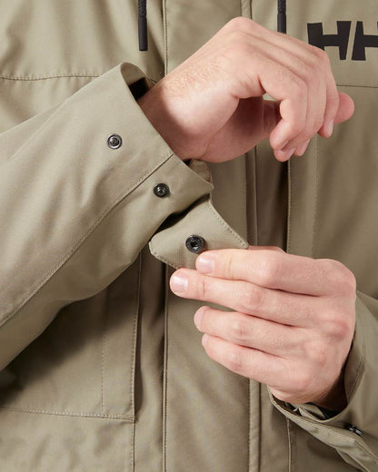 Pebble Coloured Helly Hansen Mens Coastal 3.0 Parka on white background 