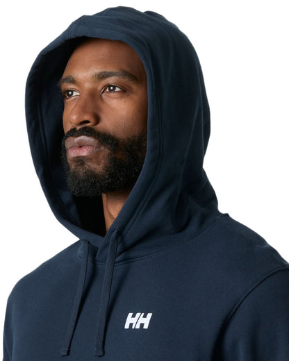 Navy coloured Helly Hansen Mens Core Graphic Hoodie on white background 