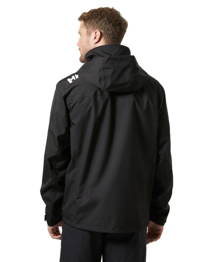 Black coloured Helly Hansen Mens Crew Hooded Jacket 2.0 on white background 