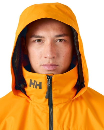 Ignite Orange Coloured Helly Hansen Mens Crew Hooded Jacket 2.0 on white background 