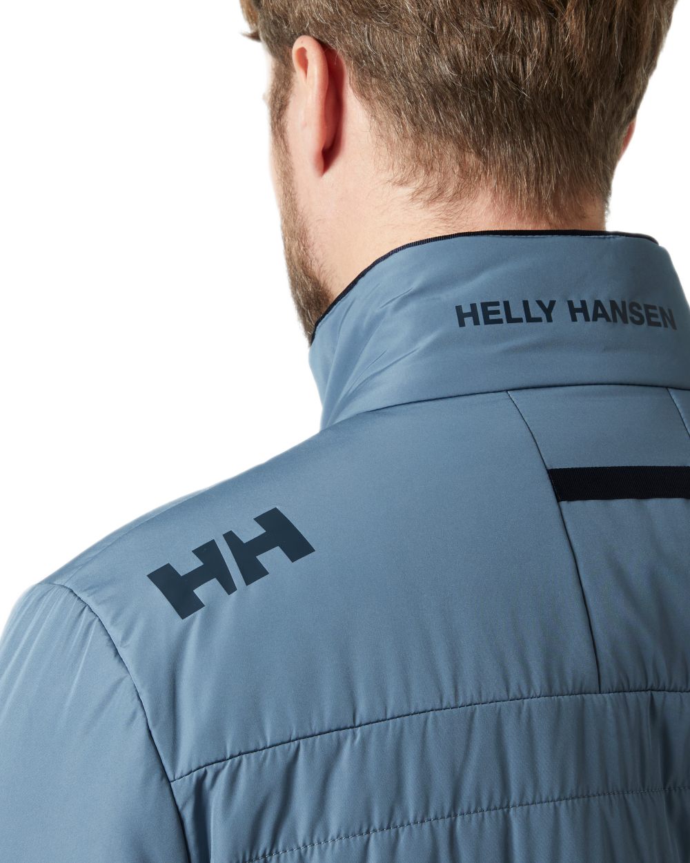 Washed Navy coloured Helly Hansen Mens Crew Insulated Sailing Jacket 2.0 on white background 