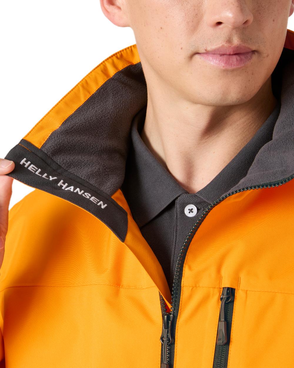 Ignite Orange Coloured Helly Hansen Mens Crew Jacket 2.0 on white background
