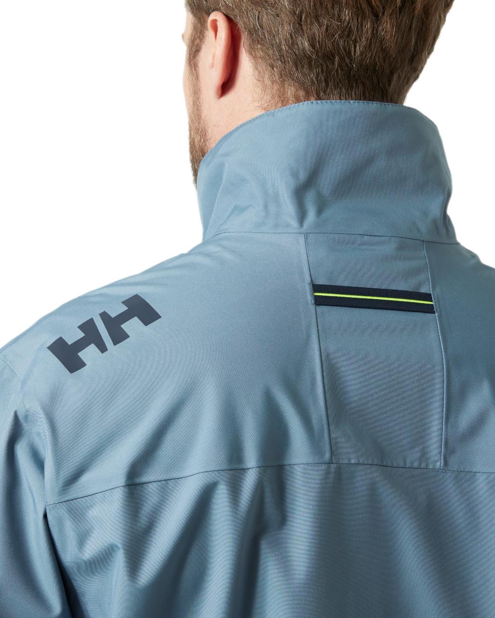 Washed Navy Coloured Helly Hansen Mens Crew Jacket 2.0 on white background

