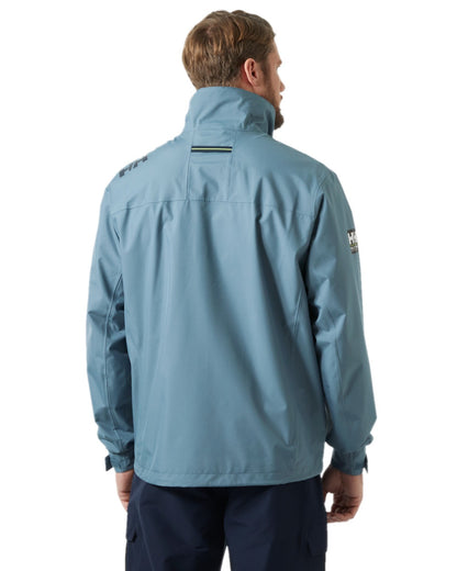 Washed Navy Coloured Helly Hansen Mens Crew Jacket 2.0 on white background
