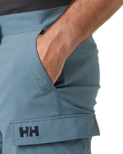 Washed Navy coloured Helly Hansen Mens Quick-Dry Cargo Shorts 11"on white background 