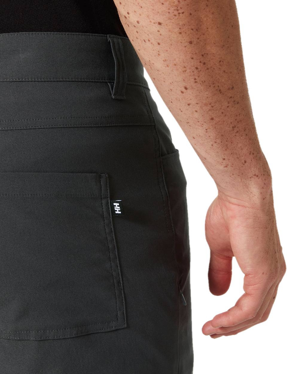Ebony coloured Helly Hansen Mens Holmen 5 Pocket Shorts on white background 
