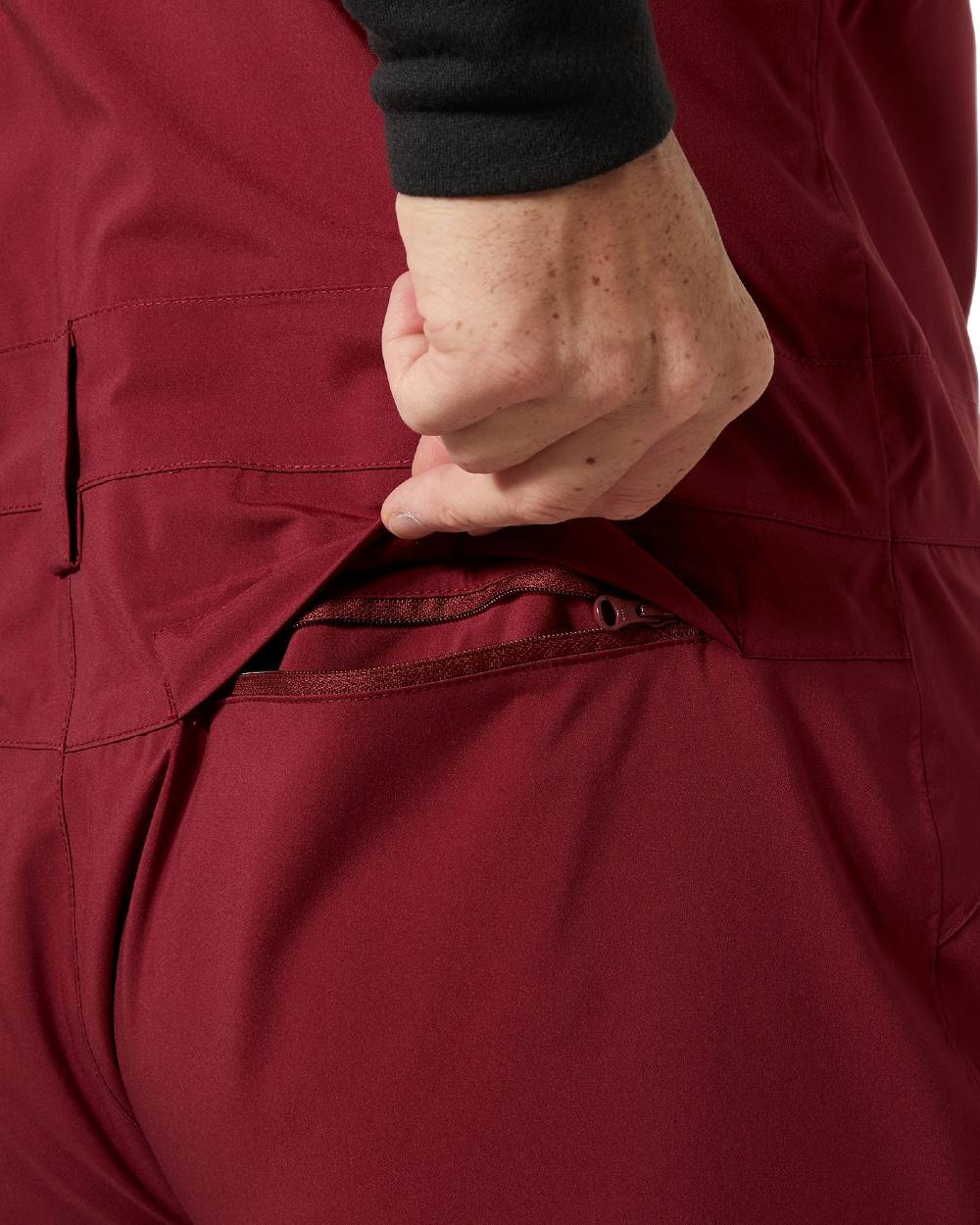 Mars Red Coloured Helly Hansen Mens Legendary Insulated Bib Pants on white background 