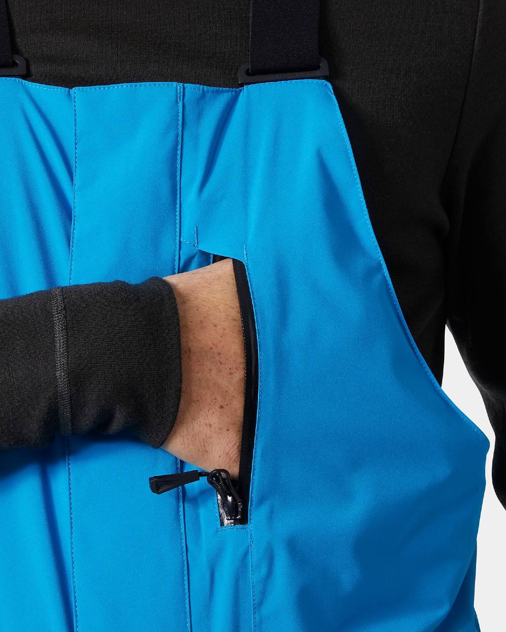 Neptune Blue Coloured Helly Hansen Mens Legendary Insulated Bib Pants on white background 