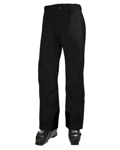 Black Coloured Helly Hansen Mens Legendary Insulated Ski Pants on white background 