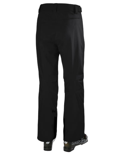 Black Coloured Helly Hansen Mens Legendary Insulated Ski Pants on white background 
