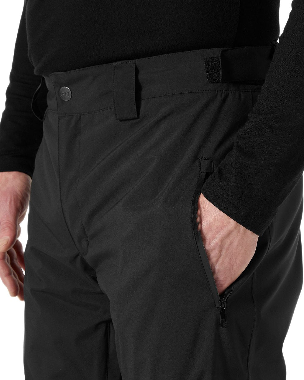 Black Coloured Helly Hansen Mens Legendary Insulated Ski Pants on white background 