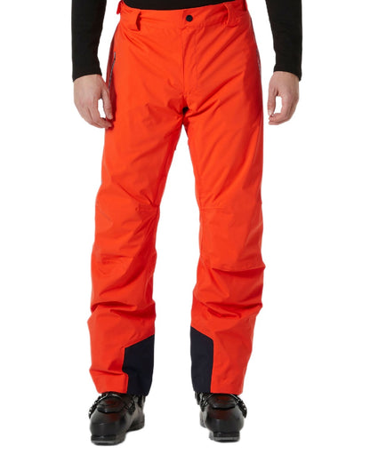 Cherry Tomato Coloured Helly Hansen Mens Legendary Insulated Ski Pants on white background 