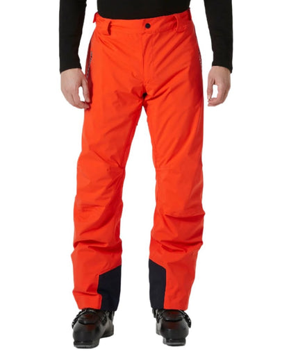 Cherry Tomato Coloured Helly Hansen Mens Legendary Insulated Ski Pants on white background 