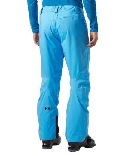 Cyan Coloured Helly Hansen Mens Legendary Insulated Ski Pants on white background 