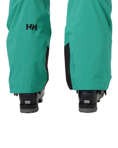Signal Green Coloured Helly Hansen Mens Legendary Insulated Ski Pants on white background 