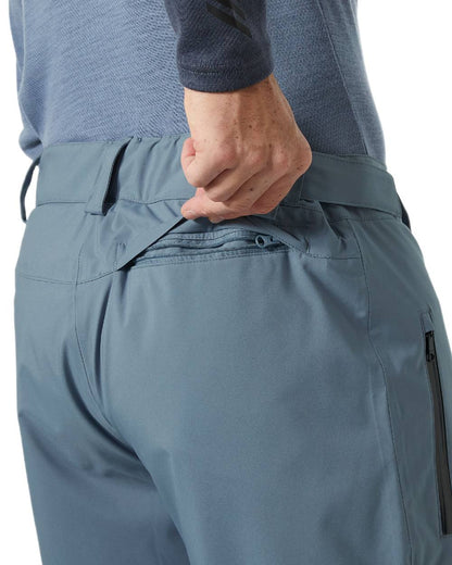 Washed Navy Coloured Helly Hansen Mens Legendary Insulated Ski Pants on white background 