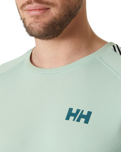 Green Mist Coloured Helly Hansen Mens Lifa Active Stripe Crew Base Layer on white background 