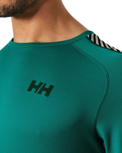 Signal Green Coloured Helly Hansen Mens Lifa Active Stripe Crew Base Layer on white background 