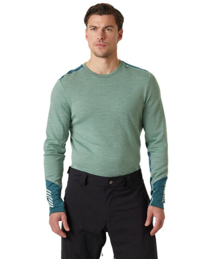 Cactus Coloured Helly Hansen Mens Lifa Merino Midweight Crew Base Layer on white background 