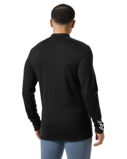 Black Coloured Helly Hansen Mens Lifa Merino Midweight Logo Base Layer on white background 