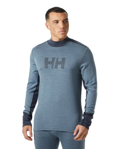 Washed Navy Coloured Helly Hansen Mens Lifa Merino Midweight Logo Base Layer on white background 