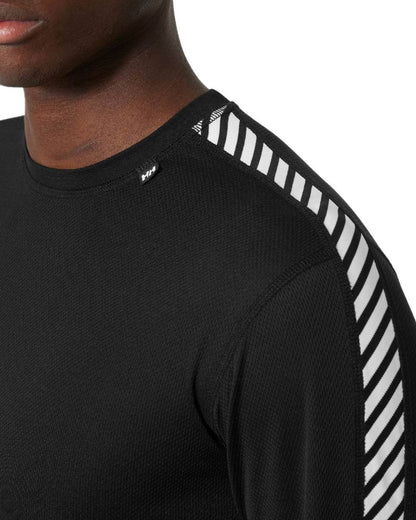 Black Coloured Helly Hansen Mens Lifa Stripe Long Sleeve Crew Base Layer on white background 