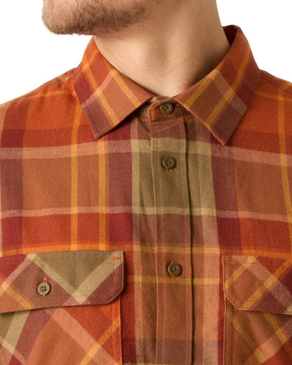 Orange coloured Helly Hansen Mens Lokka Flannel Long Sleeve Shirt On White Background 