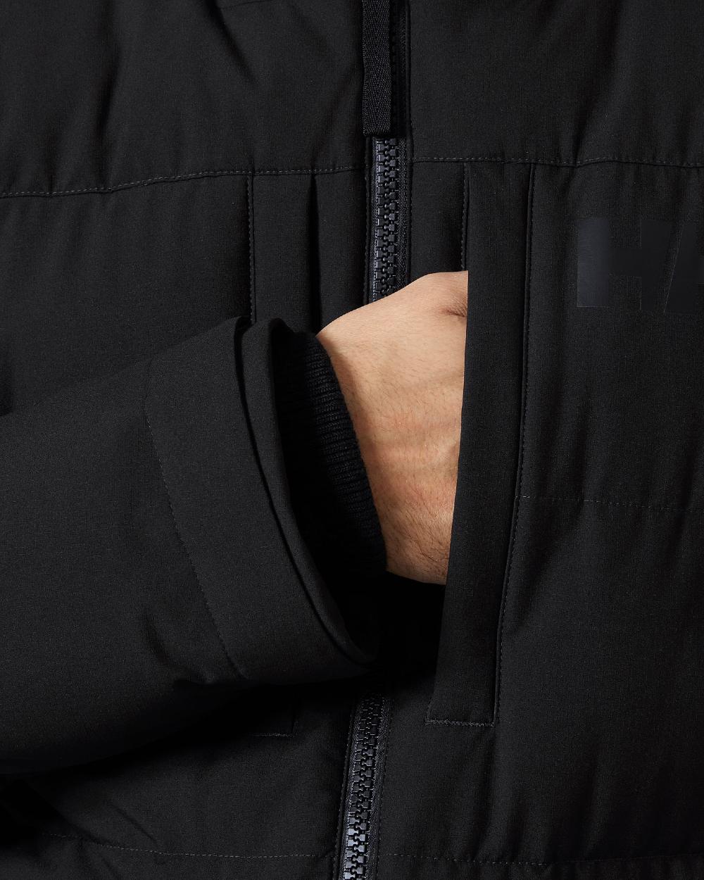Black Coloured Helly Hansen Mens Patrol Puffy Jacket on white background 