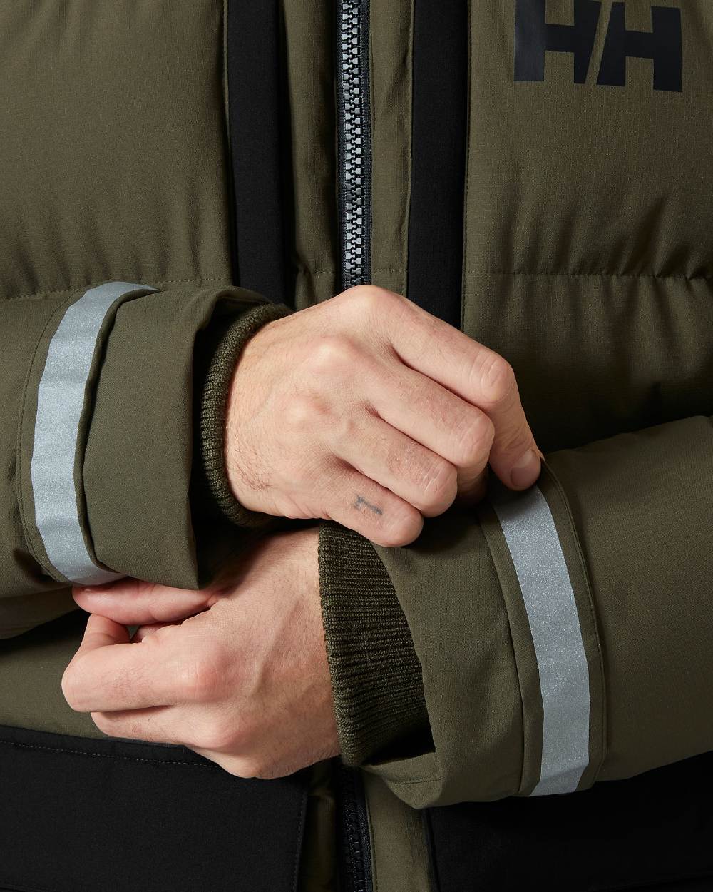 Utility Green Coloured Helly Hansen Mens Patrol Puffy Jacket on white background 