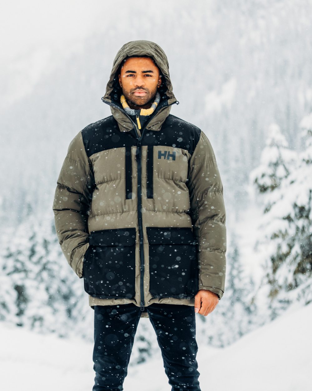 Utility Green Coloured Helly Hansen Mens Patrol Puffy Jacket on snow background 