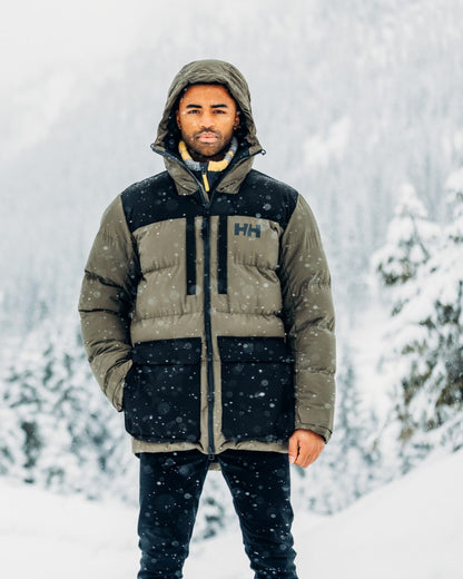 Utility Green Coloured Helly Hansen Mens Patrol Puffy Jacket on snow background 