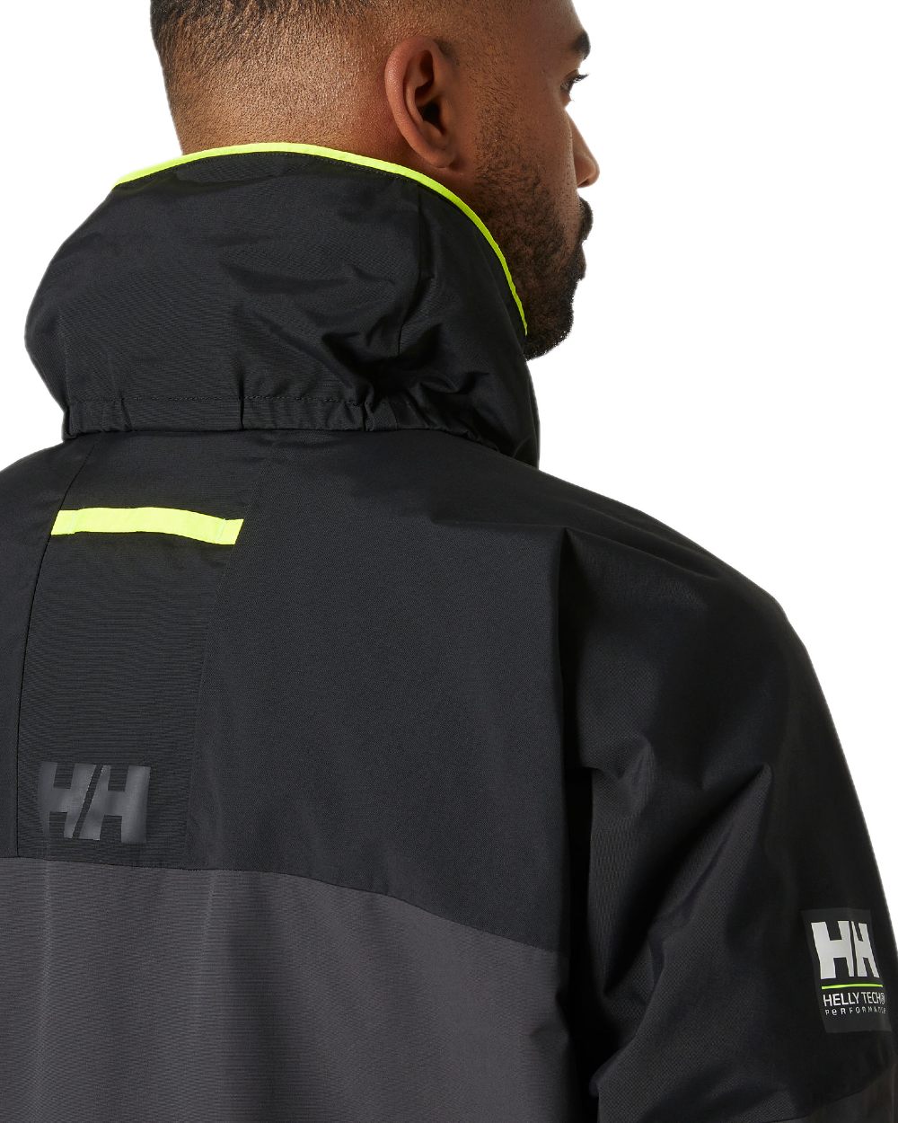 Ebony coloured Helly Hansen Mens Pier 4.0 Jacket on white background 