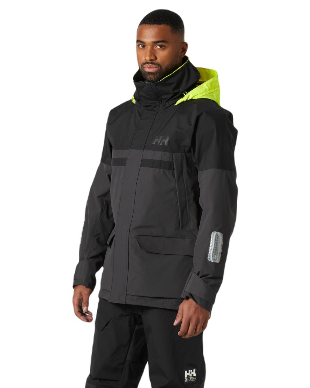 Ebony coloured Helly Hansen Mens Pier 4.0 Jacket on white background 