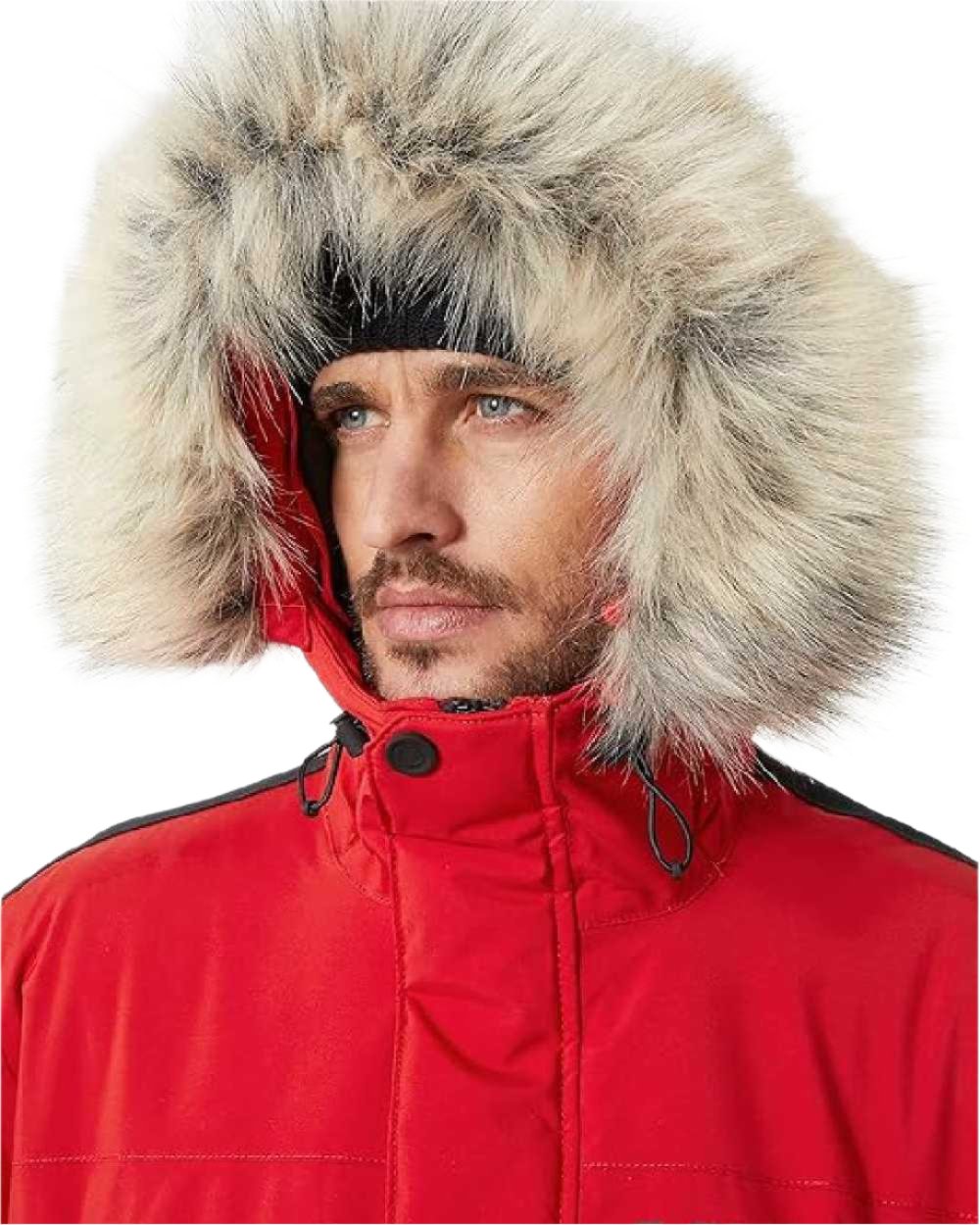 Red coloured Helly Hansen Mens Reine Winter Parka on white background 