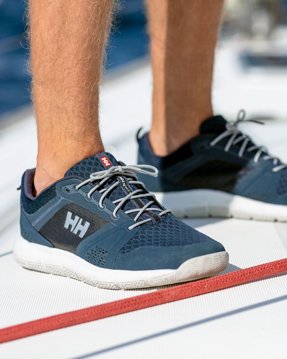 Navy Graphite Blue Off Coloured Helly Hansen Mens Skagen F-1 Offshore Shoes on outdoor background 