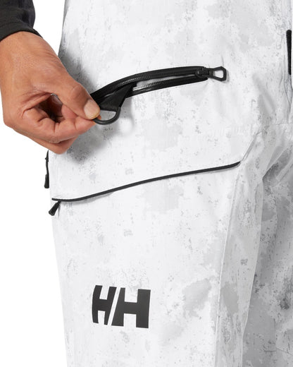 Grey Fog Snow Camo Aop Coloured Helly Hansen Mens Sogn Bib Shell Pant on white background 