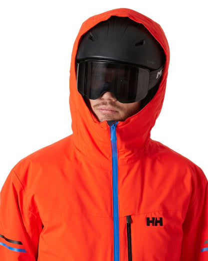 Cherry Tomato Coloured Helly Hansen Mens Swift Team Insulated Ski Jacket on white background 